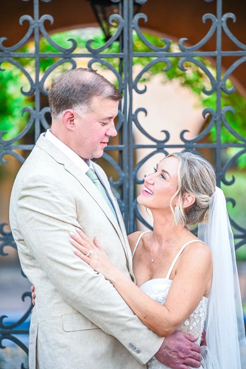 Bride holding bouquet in church sanctuary