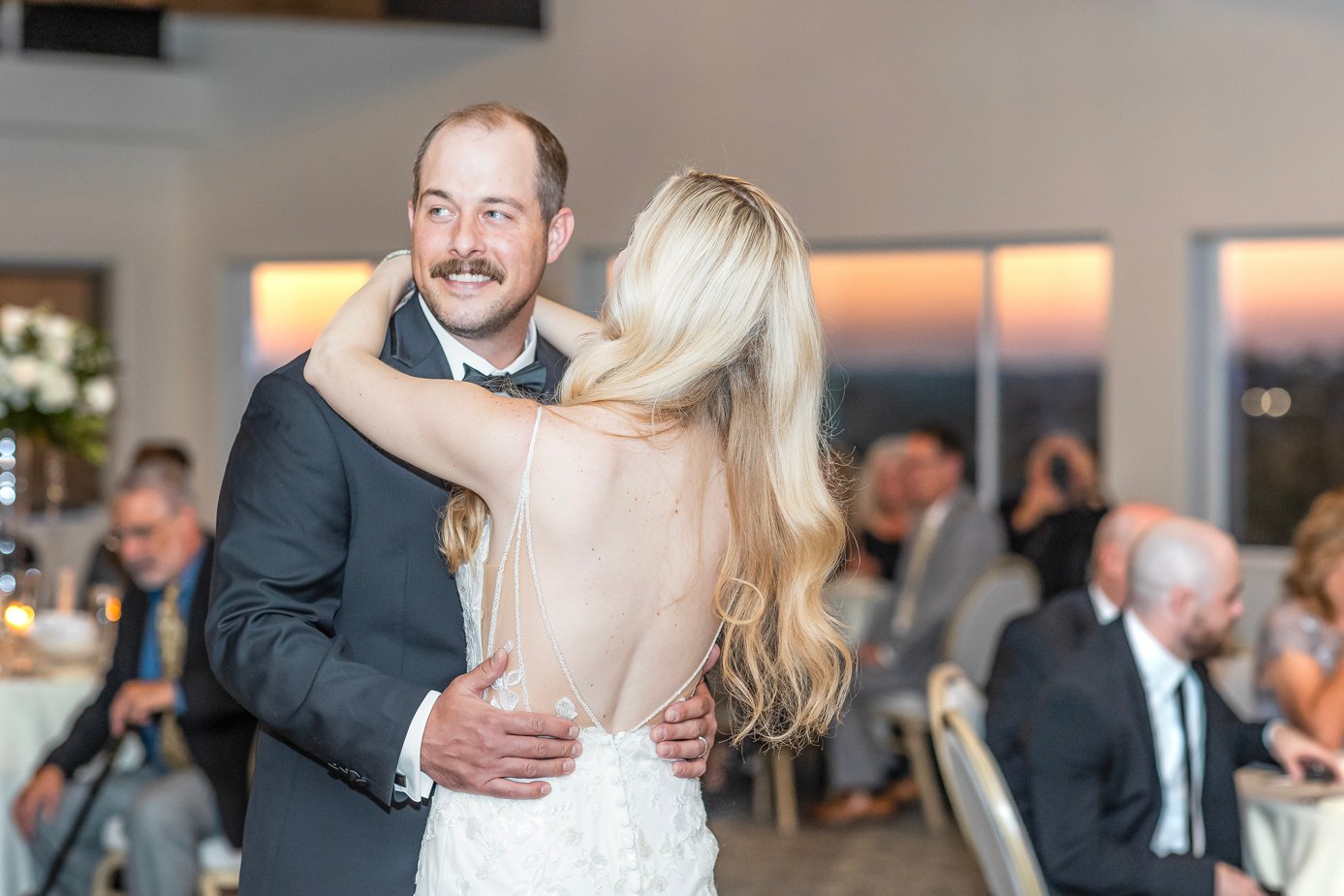 Wedding couple on the Wrigley Mansion terrace with Phoenix skyline
