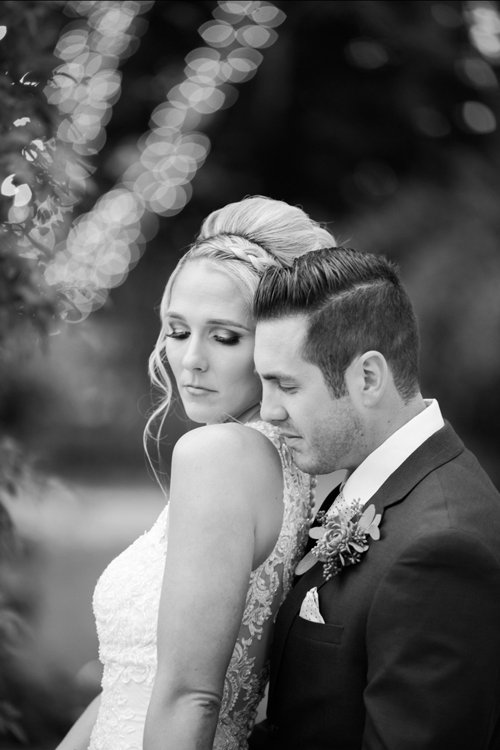 Screenshot Black and white intimate wedding portrait of bride and groom