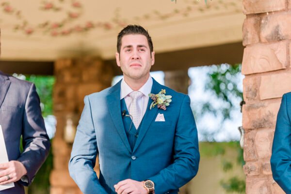 Groom portrait outdoors in blue suit